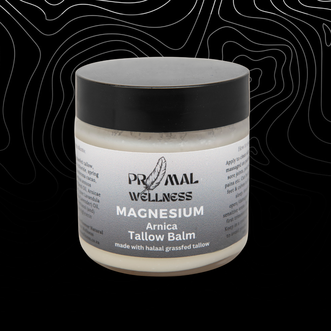 Jar of Primal Wellness magnesium Arnica Tallow Balm on a black background