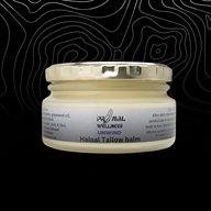 Jar of Primal Wellness Halal Tallow balm on a black background