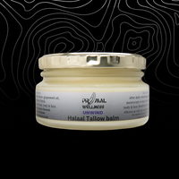 Jar of Primal Wellness Halal Tallow balm on a black background