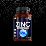 Supplement bottle labeled 'Zinc' with New Leaf Products branding on a dark background