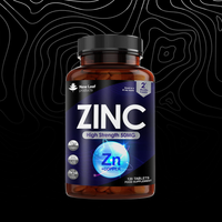 Supplement bottle labeled 'Zinc' with New Leaf Products branding on a dark background