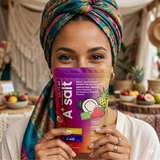Woman holding a Salty A+ drink package with a colorful background